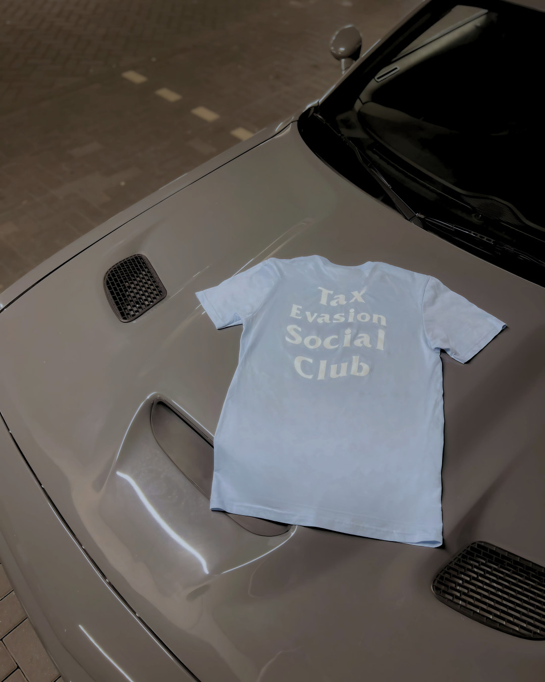 "Tax Evasion Social Club" Tee